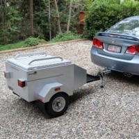 What is the maximum speed a car towing a light trailer can drive on a ...